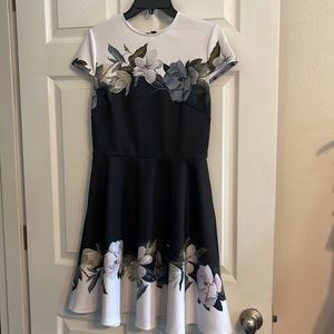 Ted Baker (international size 2) fits a U.S. 6 Black, floral dress